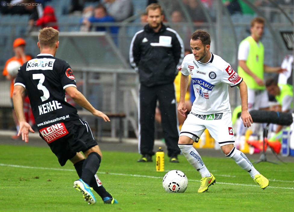 Sturm Graz - Wolfsberg
Oesterreichische Fussball Bundesliga, 6. Runde, SK Sturm Graz - Wolfsberger AC, Stadion Liebenau Graz, 23.08.2014. 

Foto zeigt Manuel Kerhe (Wolfsberg) und Christian Klem (Sturm)
