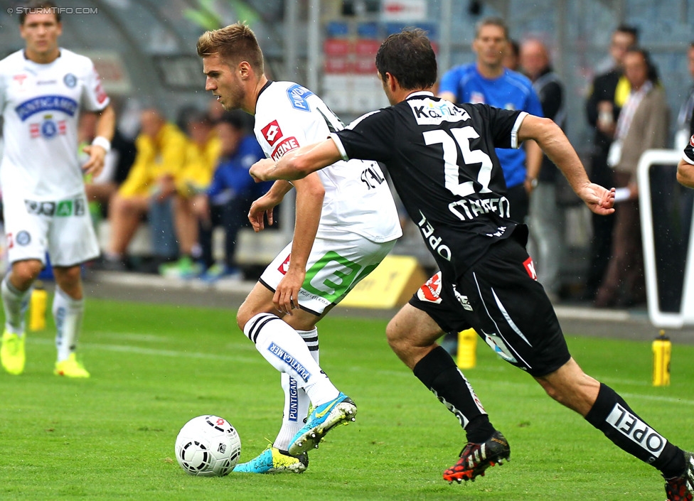 Sturm Graz - Wolfsberg
Oesterreichische Fussball Bundesliga, 6. Runde, SK Sturm Graz - Wolfsberger AC, Stadion Liebenau Graz, 23.08.2014. 

Foto zeigt Lukas Spendlhofer (Sturm) und Joachim Standfest (Wolfsberg)
