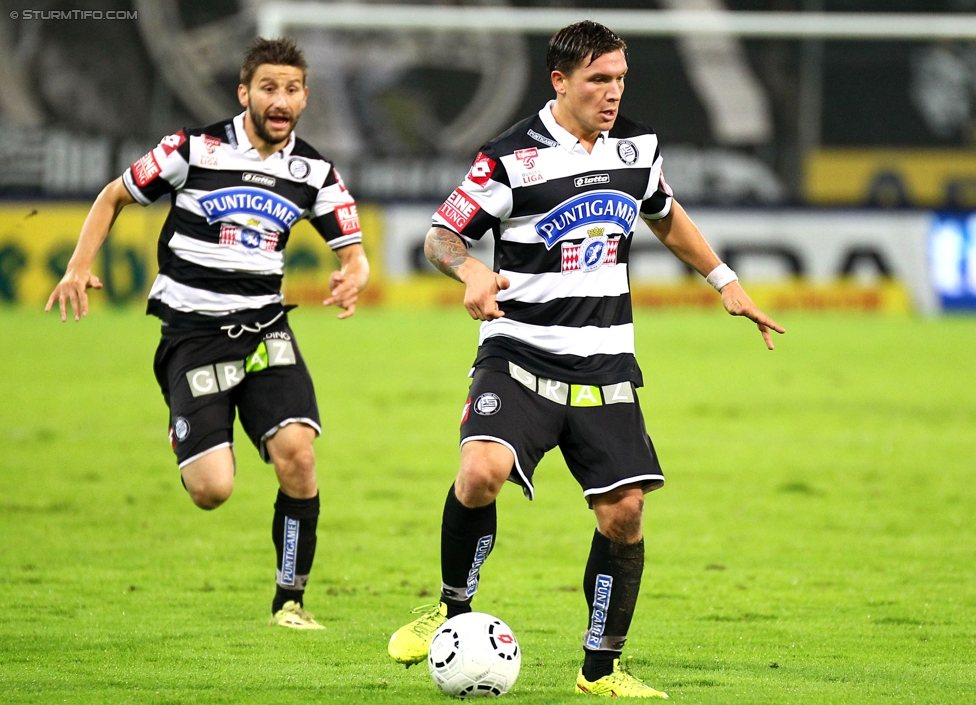 Sturm Graz - Admira Wacker
Oesterreichische Fussball Bundesliga, 8. Runde, SK Sturm Graz - FC Admira Wacker Moedling, Stadion Liebenau Graz, 13.09.2014. 

Foto zeigt Aleksandar Todorovski (Sturm) und Marko Stankovic (Sturm)
