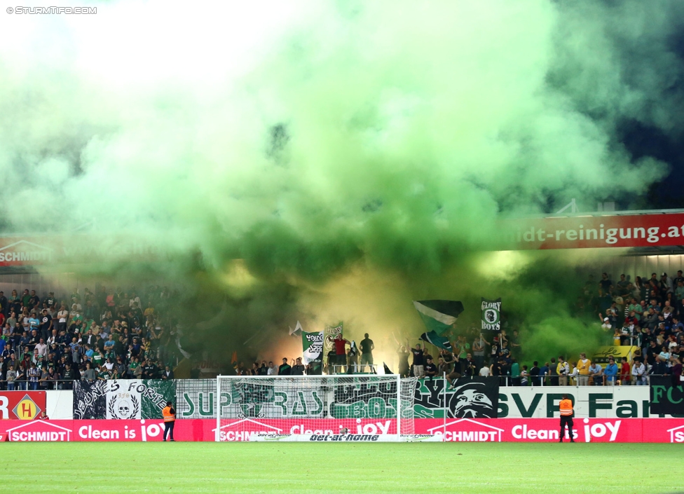 Ried - Sturm Graz
Oesterreichische Fussball Bundesliga, 9. Runde, SV Ried - SK Sturm Graz, Arena Ried, 20.09.2014. 

Foto zeigt Fans von Ried mit einer Choreografie
