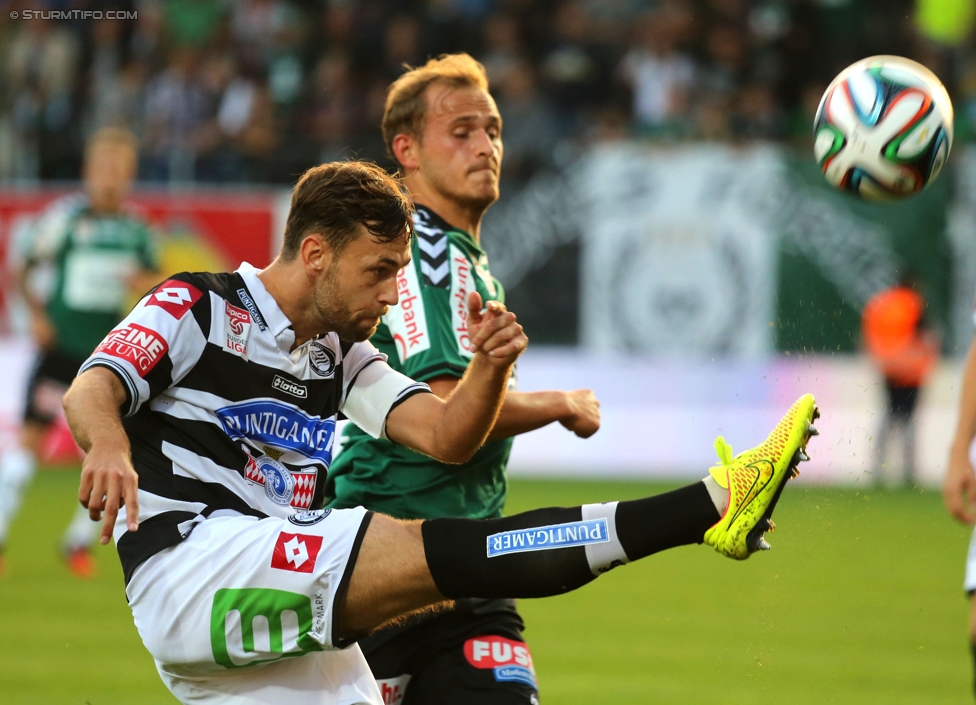 Ried - Sturm Graz
Oesterreichische Fussball Bundesliga, 9. Runde, SV Ried - SK Sturm Graz, Arena Ried, 20.09.2014. 

Foto zeigt Michael Madl (Sturm)
