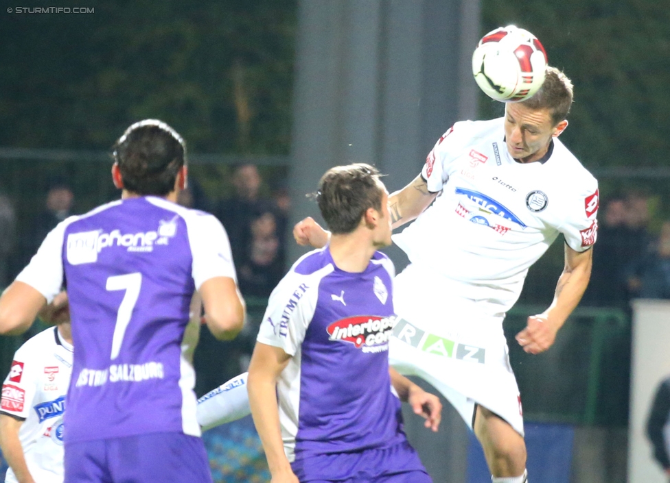 Austria Salzburg - Sturm Graz
OEFB Cup, 2. Runde, SV Austria Salzburg - SK Sturm Graz, Stadion Voecklabruck, 23.09.2014. 

Foto zeigt Umberto Gruber (A. Salzburg) und  Daniel Beichler (Sturm)
