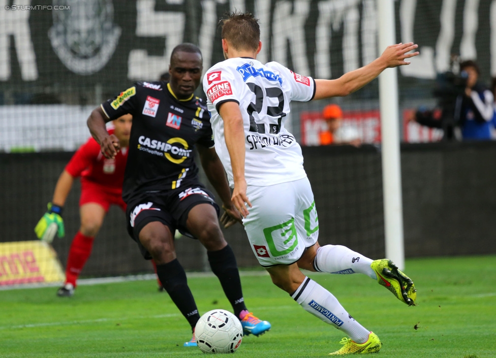 Sturm Graz - Altach
Oesterreichische Fussball Bundesliga, 10. Runde, SK Sturm Graz - SCR Altach, Stadion Liebenau Graz, 27.09.2014. 

Foto zeigt Louis Clement Ngwat Mahop (Altach) und Lukas Spendlhofer (Sturm)
