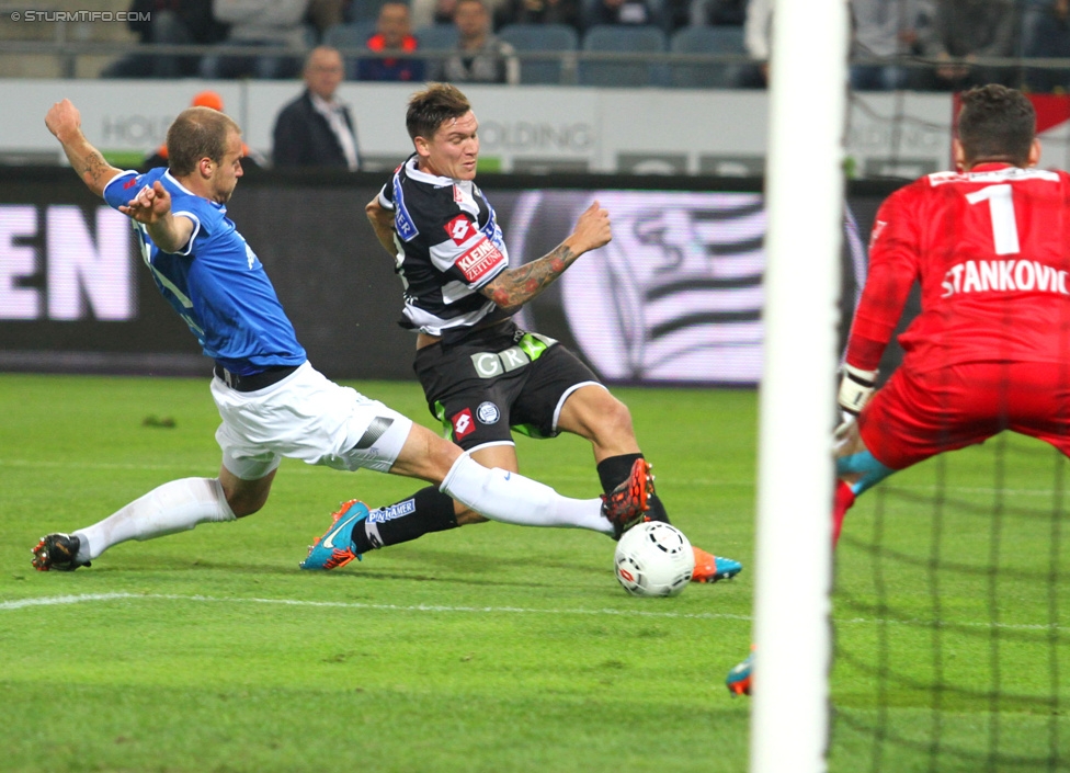 Sturm Graz - Groedig
Oesterreichische Fussball Bundesliga, 11. Runde, SK Sturm Graz - SV Groedig, Stadion Liebenau Graz, 04.10.2014. 

Foto zeigt Marko Stankovic (Sturm) und Cican Stankovic (Groedig)
