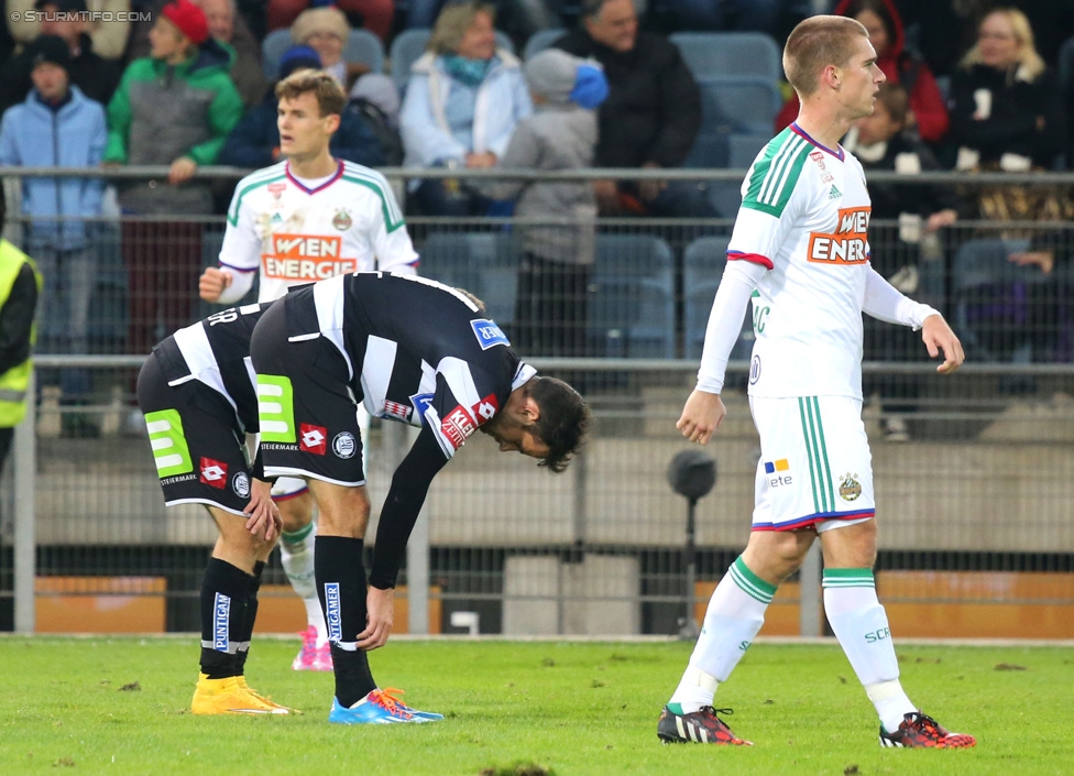 Sturm Graz - Rapid Wien
Oesterreichische Fussball Bundesliga, 13. Runde, SK Sturm Graz - SK Rapid Wien, Stadion Liebenau Graz, 25.10.2014. 

Foto zeigt Stefan Stangl (Rapid) und Josip Tadic (Sturm)
