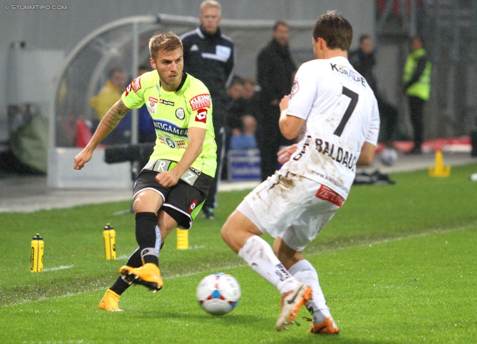 Wolfsberg - Sturm Graz
Oesterreichische Fussball Bundesliga, 15. Runde, Wolfsberger AC - SK Sturm Graz, Woertherseestadion Klagenfurt, 08.11.2014. 

Foto zeigt Thorsten Schick (Sturm) und Dario Baldauf (Wolfsberg)
