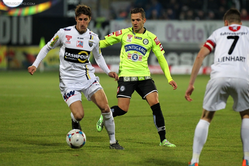 Altach - Sturm Graz
Oesterreichische Fussball Bundesliga, 19. Runde, SCR Altach - SK Sturm Graz, Stadion Schnabelholz Altach, 13.12.2014. 

Foto zeigt Daniel Offenbacher (Sturm) und Andreas Lienhart (Altach)
