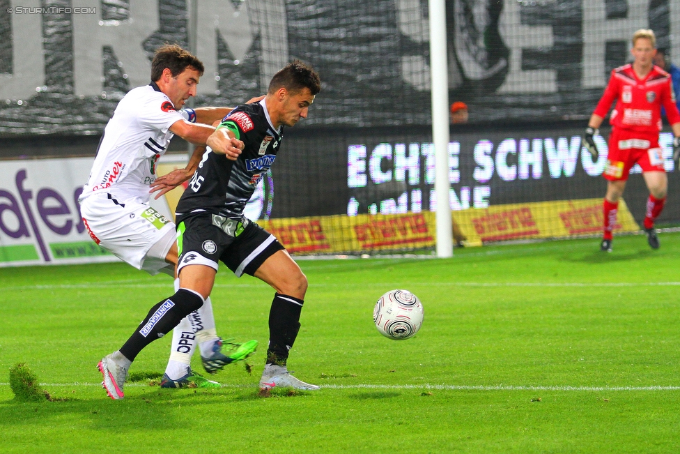 Sturm Graz - Wolfsberg
Oesterreichische Fussball Bundesliga, 13. Runde, SK Sturm Graz - Wolfsburger AC, Stadion Liebenau Graz, 24.10.2015. 

Foto zeigt Joachim Standfest (Wolfsberg) und Kristijan Dobras (Sturm)
