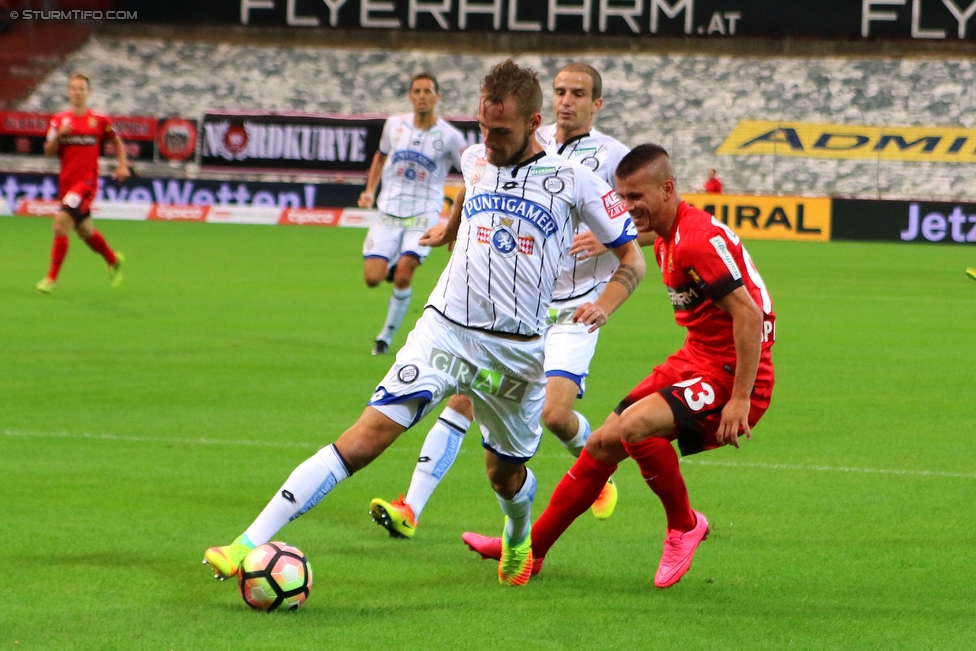 Admira Wacker - Sturm Graz
Oesterreichische Fussball Bundesliga, 8. Runde, FC Admira Wacker Moedling - SK Sturm Graz, Stadion Suedstadt Maria Enzersdorf, 17.09.2016. 

Foto zeigt Lukas Spendlhofer (Sturm) und Srdan Spiridinovic (Admira)
