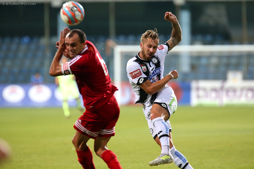 Podgorica - Sturm Graz
UEFA Europa League Qualifikation 2. Runde, FK Mladost Podgorica - SK Sturm Graz, Gradski Stadion Podgorica, 20.07.2017. 

Foto zeigt Mirko Rajcevic (Podgorica) und Peter Zulj (Sturm)
