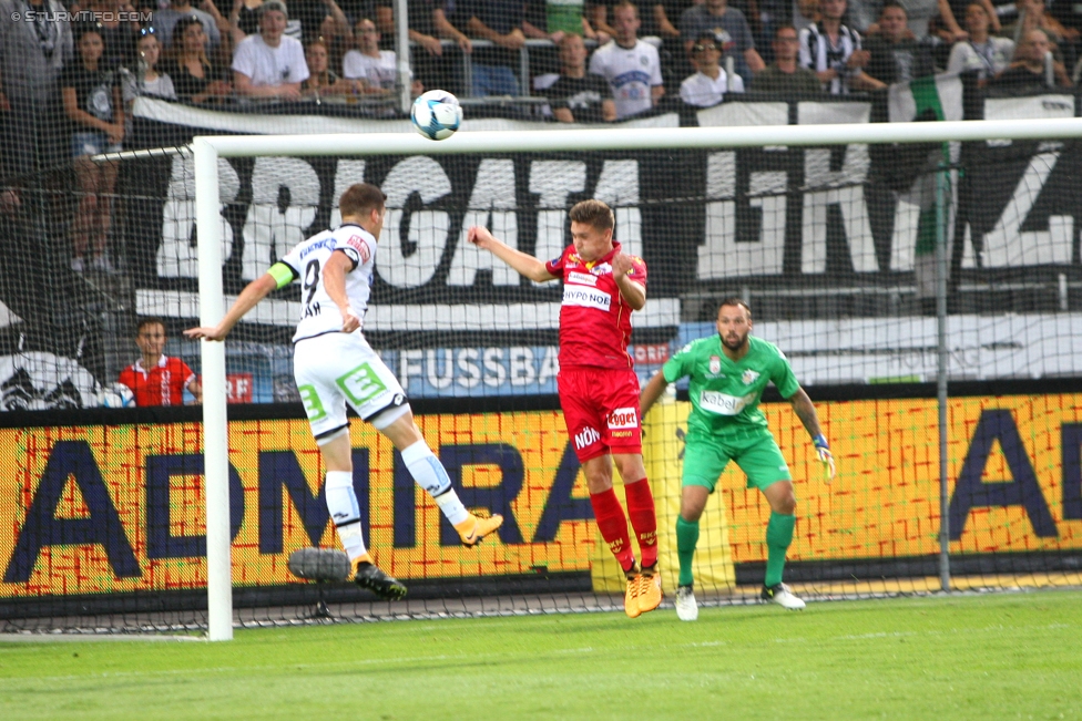 Sturm Graz - St. Poelten
Oesterreichische Fussball Bundesliga, 1. Runde, SK Sturm Graz - SKN St. Poelten, Stadion Liebenau Graz, 23.07.2017. 

Foto zeigt Deni Alar (Sturm) und Christoph Riegler (St. Poelten)
