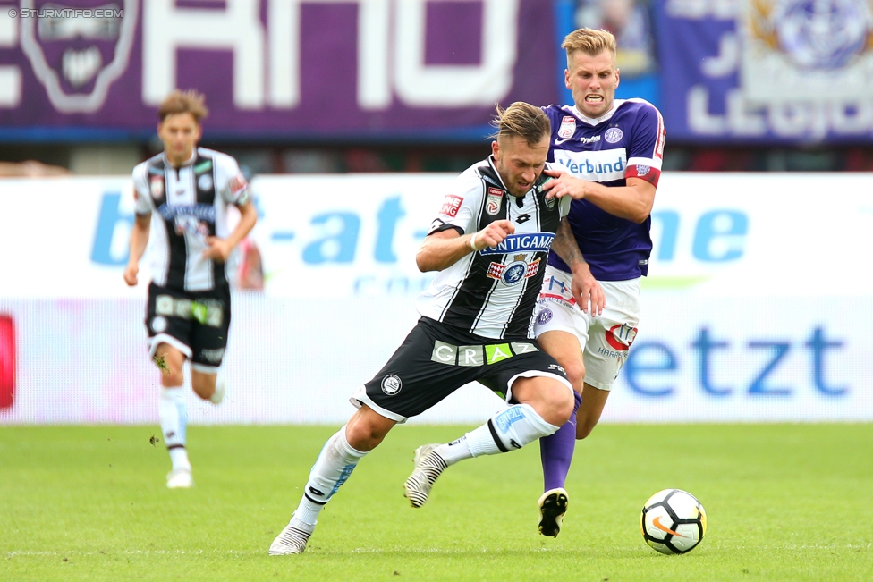 Austria Wien - Sturm Graz
Oesterreichische Fussball Bundesliga, 2. Runde, FK Austria Wien - SK Sturm Graz, Ernst Happel Stadion Wien, 30.07.2017. 

Foto zeigt Peter Zulj (Sturm) und Alexander Gruenwald (Austria)
