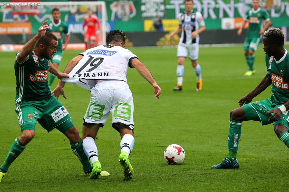 Rapid Wien - Sturm Graz
Oesterreichische Fussball Bundesliga, 5. Runde, SK Rapid Wien - SK Sturm Graz, Weststadion Wien, 19.08.2017. 

Foto zeigt Steffen Hofmann (Rapid), Marvin Potzmann (Sturm) und Boli Bolingoli-Mbombo (Rapid)
