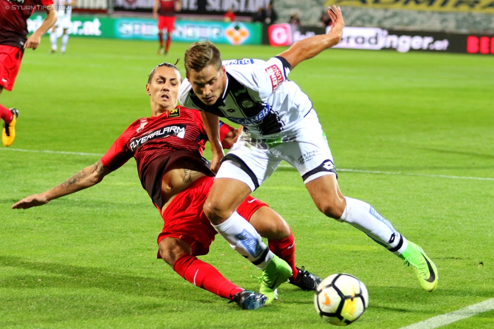 Admira Wacker - Sturm Graz
Oesterreichische Fussball Bundesliga, 8. Runde, FC Admira Wacker Moedling - SK Sturm Graz, Stadion Suedstadt Maria Enzersdorf, 16.09.2017. 

Foto zeigt Maximilian Sax (Admira) und Thorsten Roecher (Sturm)
