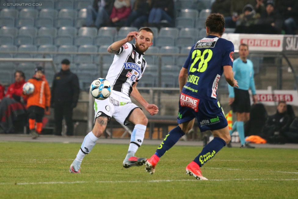 Sturm Graz - Wolfsberg
Oesterreichische Fussball Bundesliga, 22. Runde, SK Sturm Graz - Wolfsberger AC, Stadion Liebenau Graz, 10.02.2018. 

Foto zeigt Jakob Jantscher (Sturm) und Thomas Zuendel (Wolfsberg)
