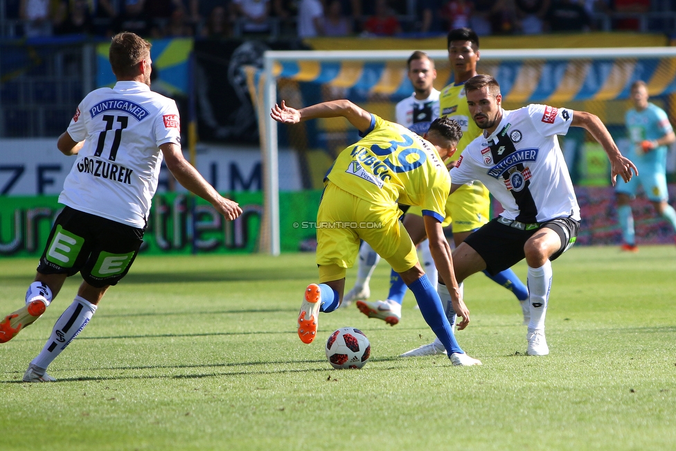 St. Poelten - Sturm Graz
Oesterreichische Fussball Bundesliga, 3. Runde, SKN St. Poelten - SK Sturm Graz, Arena St. Poelten, 12.08.2018. 

Foto zeigt Lukas Grozurek (Sturm), Robert Ljubicic (St. Poelten) und Markus Lackner (Sturm)
