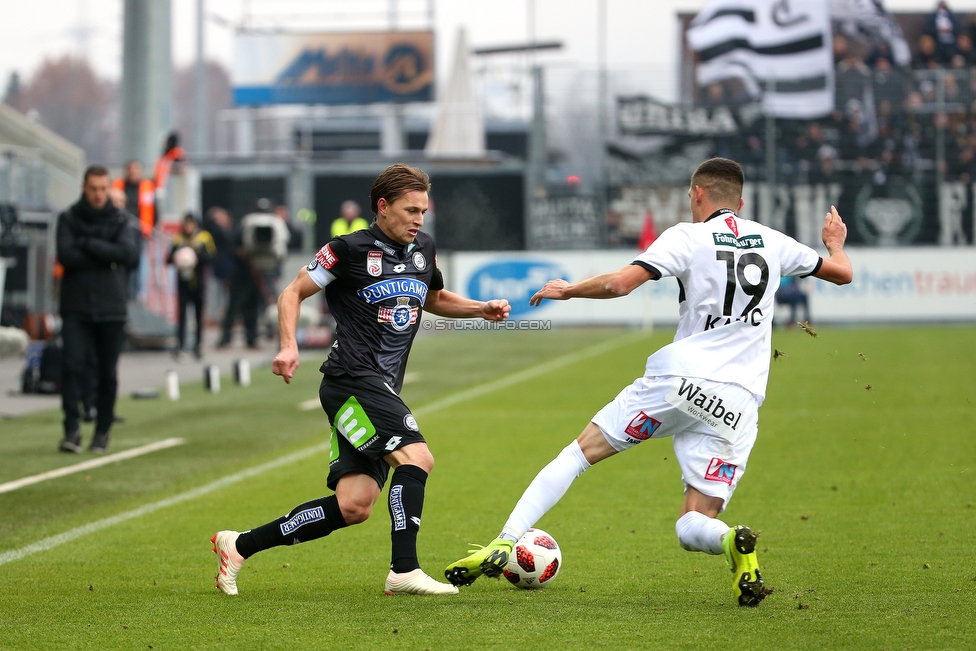 Altach - Sturm Graz
Oesterreichische Fussball Bundesliga, 15. Runde, SCR Altach - SK Sturm Graz, Stadion Schnabelholz Altach, 25.11.2018. 

Foto zeigt Stefan Hierlaender (Sturm) und Emir Karic (Altach)
