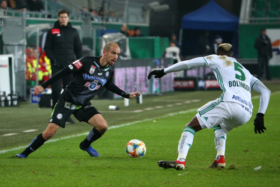 Rapid Wien - Sturm Graz
Oesterreichische Fussball Bundesliga, 17. Runde, SK Rapid Wien - SK Sturm Graz, Weststadion Wien, 09.12.2018. 

Foto zeigt Fabian Koch (Sturm) und Boli Bolingoli-Mbombo (Rapid)
