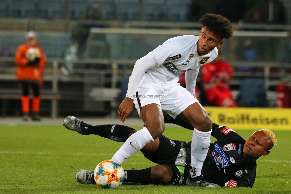 Sturm Graz - Admira Wacker
Oesterreichische Fussball Bundesliga, 18. Runde, SK Sturm Graz - FC Admira Wacker Moedling, Stadion Liebenau Graz, 15.12.2018. 

Foto zeigt Eldis Bajrami (Admira) und Emeka Friday Eze (Sturm)
