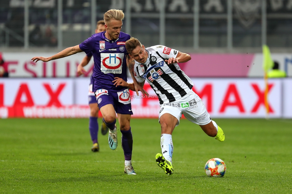 Austria Wien - Sturm Graz
Oesterreichische Fussball Bundesliga, 10. Runde, FK Austria Wien - SK Sturm Graz, Franz Horr Stadion Wien, 06.10.2019. 

Foto zeigt James Jeggo (Austria) und Thorsten Roecher (Sturm)
