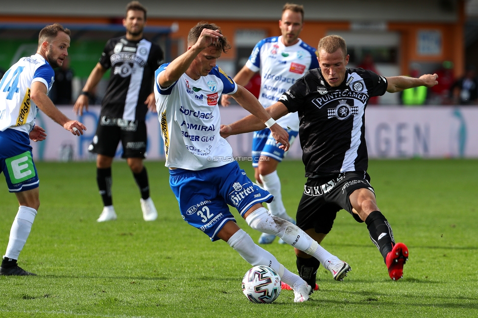 Hartberg - Sturm Graz
Oesterreichische Fussball Bundesliga, 3. Runde, TSV Hartberg - SK Sturm Graz, Arena Hartberg, 27.09.2020. 

Foto zeigt Felix Luckeneder (Hartberg) und Bekim Balaj (Sturm)
