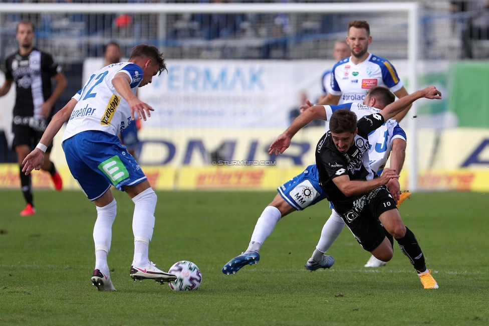 Hartberg - Sturm Graz
Oesterreichische Fussball Bundesliga, 3. Runde, TSV Hartberg - SK Sturm Graz, Arena Hartberg, 27.09.2020. 

Foto zeigt Felix Luckeneder (Hartberg) und Otar Kiteishvili (Sturm)
