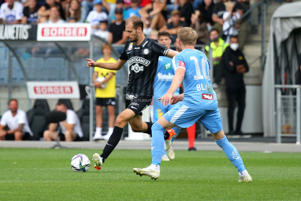 Sturm Graz - WSG Tirol
Oesterreichische Fussball Bundesliga, 8. Runde, SK Sturm Graz - WSG Tirol, Stadion Liebenau Graz, 19.09.2021. 

Foto zeigt Jon Gorenc-Stankovic (Sturm) und Bror Blume (Tirol)
