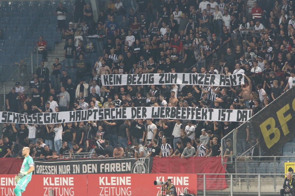 Sturm Graz - LASK
Oesterreichische Fussball Bundesliga, 5. Runde, SK Sturm Graz - LASK, Stadion Liebenau Graz, 20.08.2022. 

Foto zeigt Fans von LASK Linz mit einem Spruchband
