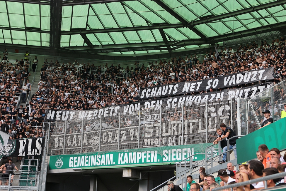 Rapid Wien - Sturm Graz
Oesterreichische Fussball Bundesliga, 6. Runde, SK Rapid Wien - SK Sturm Graz, Weststadion Wien, 28.08.2022. 

Foto zeigt Fans von Sturm mit einem Spruchband
