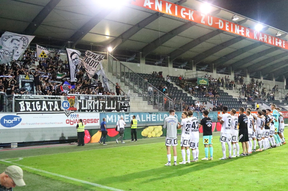 Altach - Sturm Graz
Oesterreichische Fussball Bundesliga, 6. Runde, SCR Altach - SK Sturm Graz, Stadion Schnabelholz Altach, 02.09.2023. 

Foto zeigt Fans von Sturm und die Mannschaft von Sturm
