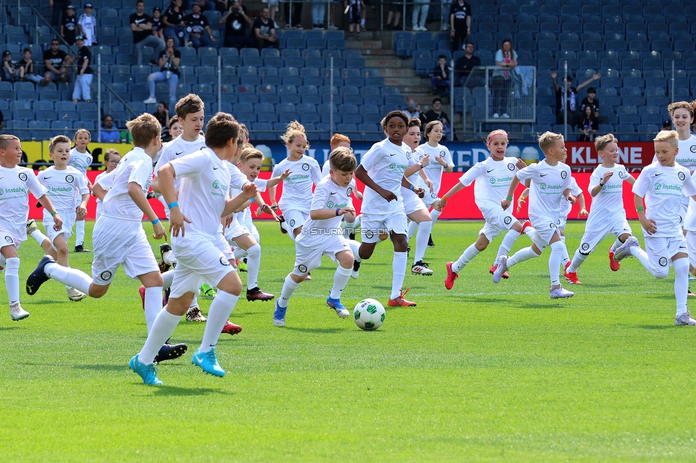 Sturm Graz - Blau-Weiss Linz
Oesterreichische Fussball Bundesliga, 26. Runde, SK Sturm Graz - FC Blau-Weiss Linz, Stadion Liebenau Graz, 20.04.2025. 

Foto zeigt das Match 100 Kids gegen Sturm mit Martin Ehrenreich (Teammanagement Sturm) und Mario Haas (ehem. Spieler Sturm)
