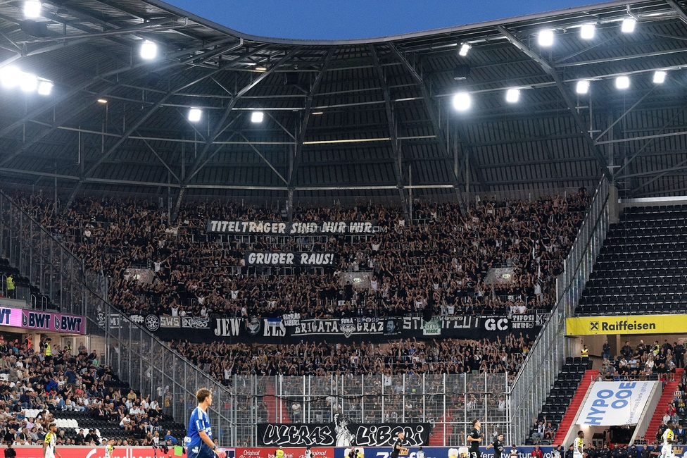 LASK - Sturm Graz
Oesterreichische Fussball Bundesliga, 1. Runde, Linzer ASK - SK Sturm Graz, Raiffeisen Arena Linz, 01.08.2025. 

Foto zeigt Fans von Sturm mit einem Spruchband
