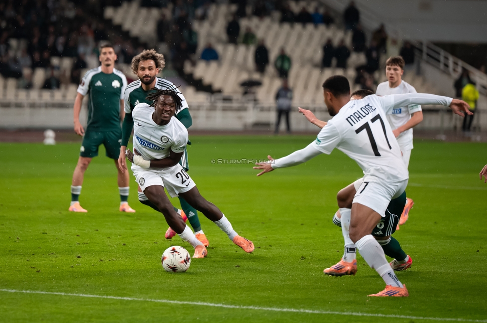 Panathinaikos - Sturm Graz
UEFA Europa League Gruppenphase 5. Spieltag, FC Panathinaikos - SK Sturm Graz, Olympiastadion Athen, 27.11.2025. 

Foto zeigt Seedy Jatta (Sturm) und Maurice Malone (Sturm)
