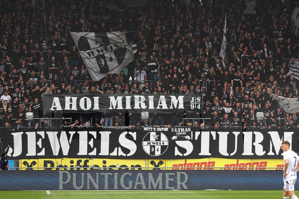 Sturm Graz - Hartberg
Oesterreichische Fussball Bundesliga, 26. Runde, SK Sturm Graz - TSV Hartberg, Stadion Graz-Liebenau, 12.04.2026. 

Foto zeigt Fans von Sturm mit einem Spruchband
Schlüsselwörter: jewels baby